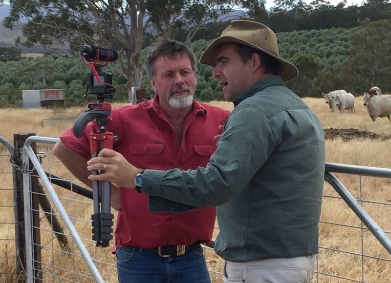 Tim interviews a local farmer